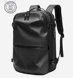 Astrava SE black backpack with vacuum compression system, water-resistant shell, TSA lock, USB port, and organized compartments for laptop and travel essentials.
