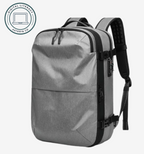 Astrava SE gray water-resistant backpack with vacuum compression system and TSA lock.