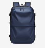 Astrava SE navy blue slim backpack with vacuum compression system and organized compartments