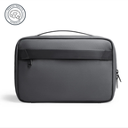 Compact gray toiletry bag with handle and zipper for organized travel essentials