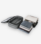 Astrava SE backpack with vacuum compression system and folded clothes showing space-saving travel design