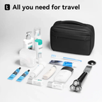 Black toiletry bag with travel-sized personal care items including lotion, toothbrush, razor, and skincare products arranged around it.