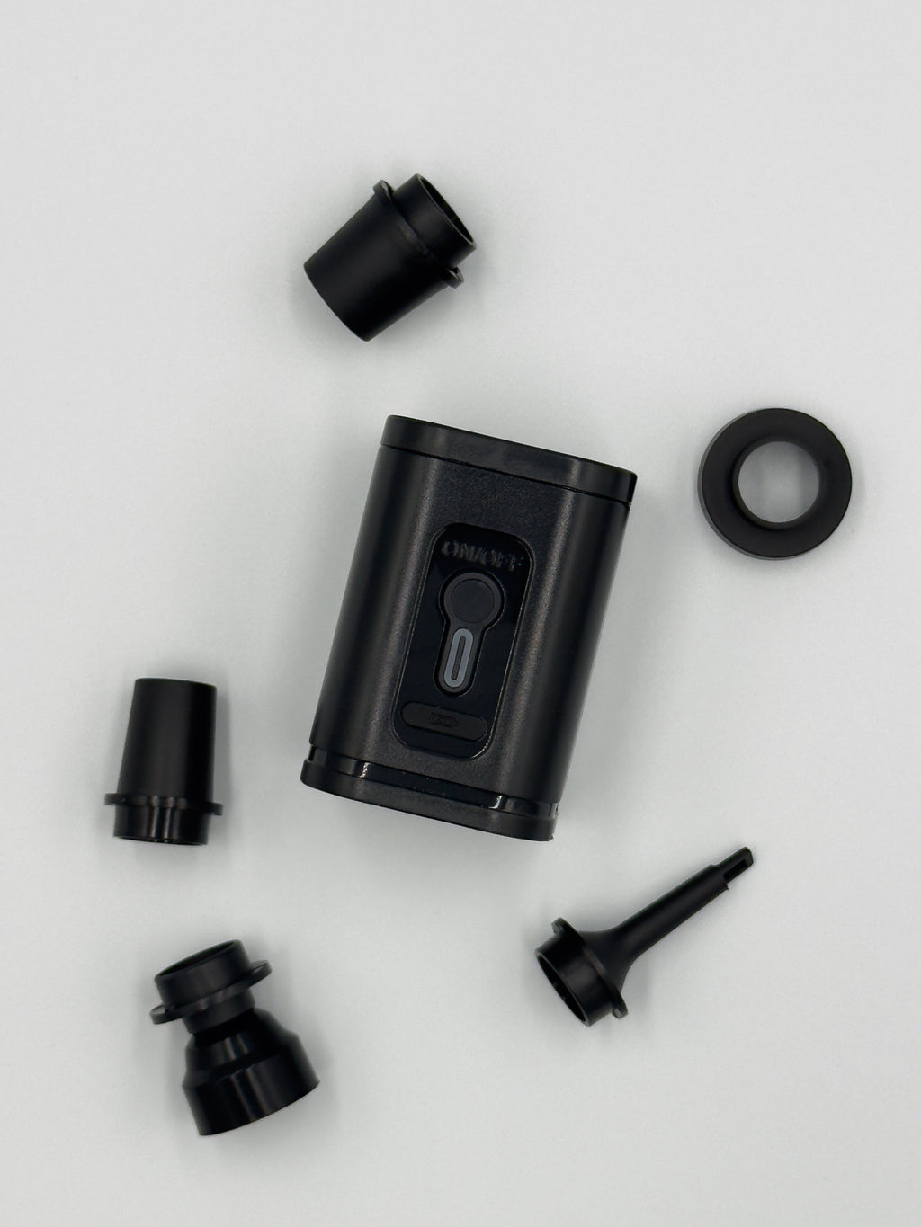 MINIVAC compact cordless vacuum pump with multiple black nozzle attachments for inflating and vacuum-sealing tasks.